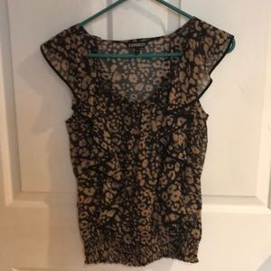 Woman’s sleeveless blouse!